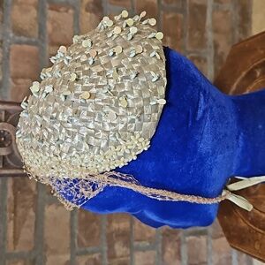 Vintage straw, beaded hat with netted tie from the 1940s or 1950s